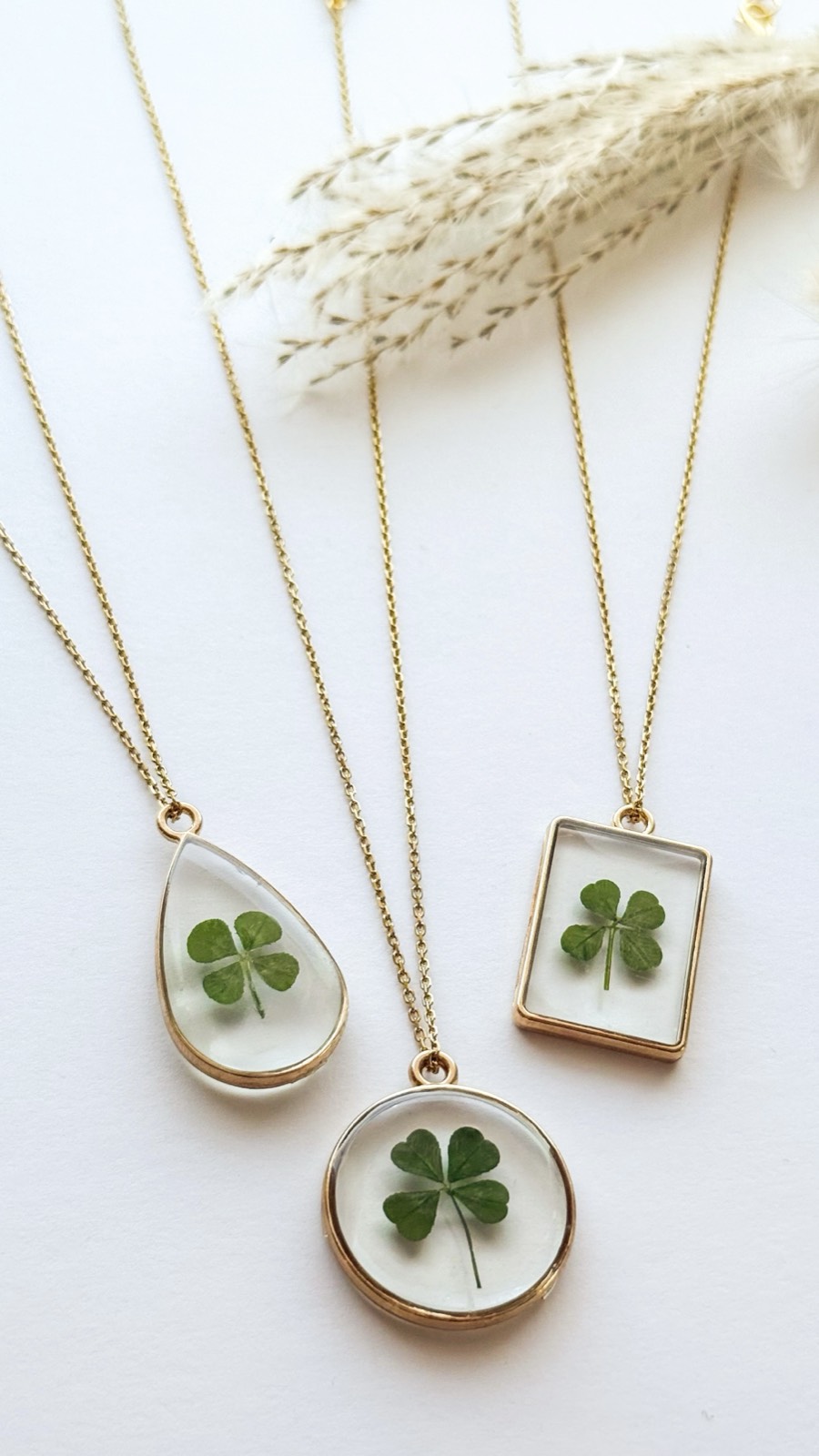 Real four-leaf clover necklaces — teardrop, circle and rectangle